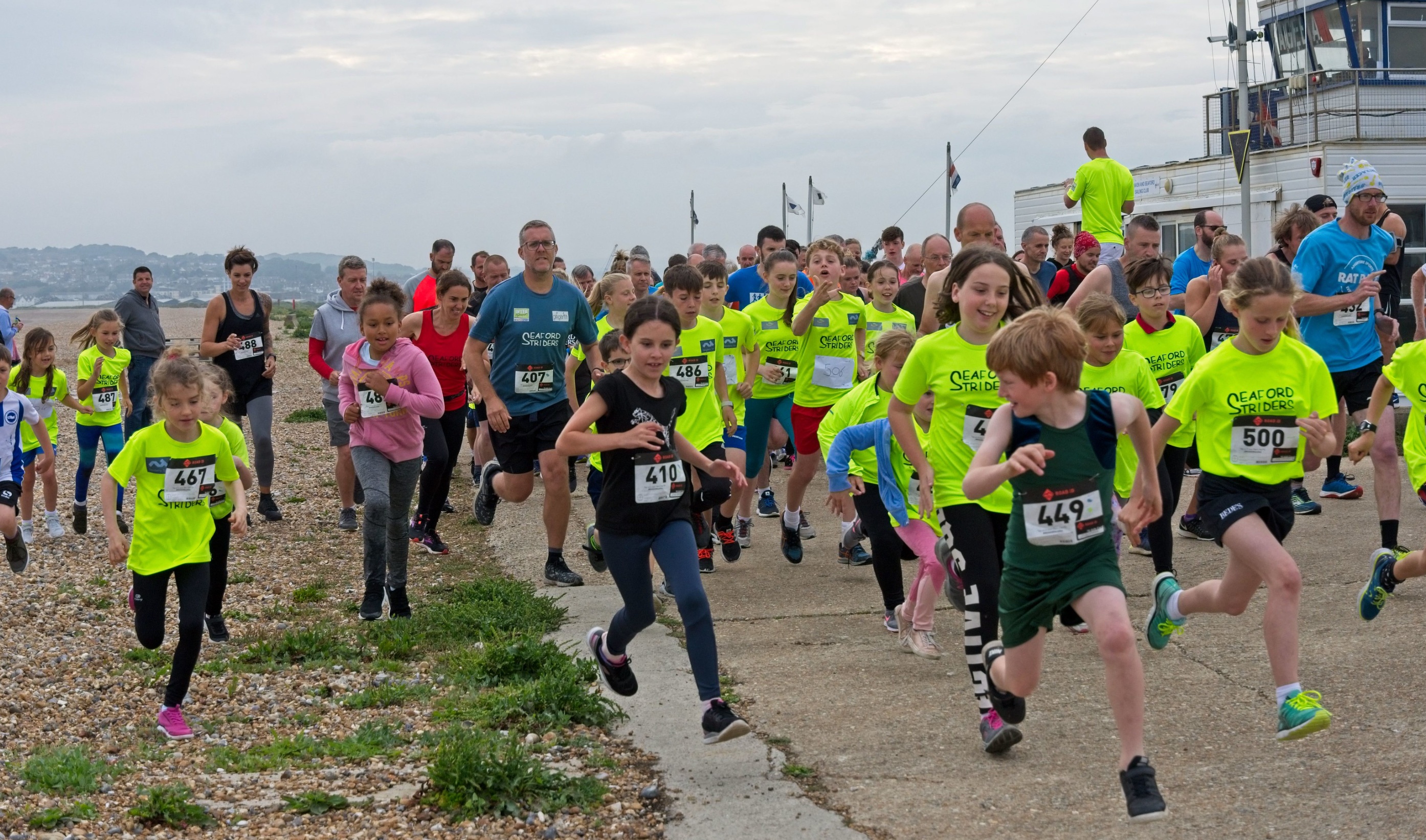 Junior Seaford Striders running 10K run along Seaford Seafront