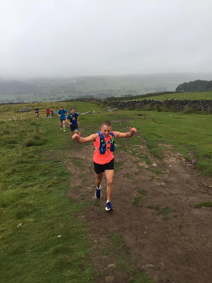 Yorkshire 3 Peaks Challenge Striders running up hill