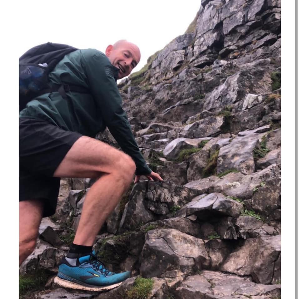Yorkshire 3 Peaks Challenge Dave climbing up steep rocks