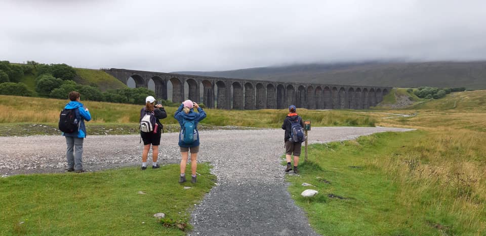 Yorkshire 3 Peaks Challenge Striders looking at bridge