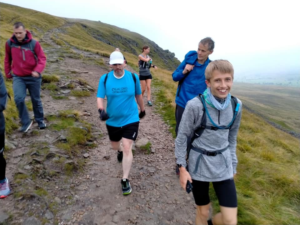 Yorkshire 3 Peaks Challenge striders on way back down